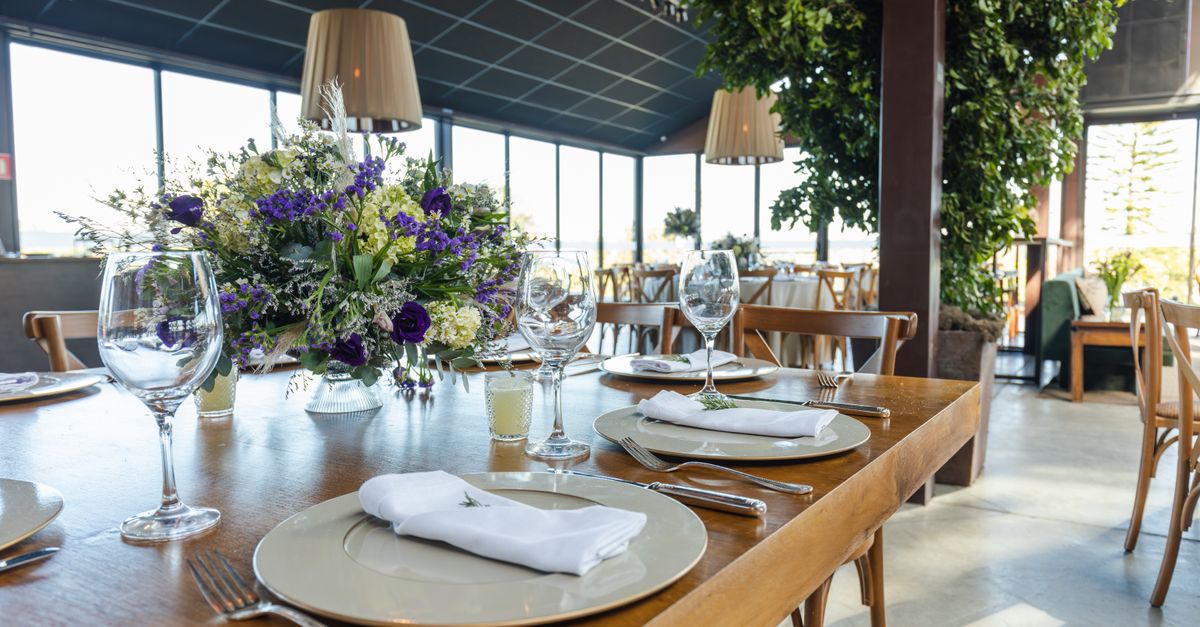 Tables set for service in a restaurant dining room